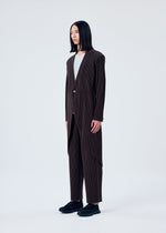 A model wears the HOMME PLISSÉ ISSEY MIYAKE TAILORED PLEATS 2 jacket.