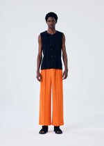 A model wears the HOMME PLISSÉ ISSEY MIYAKE TAILORED PLEATS 1 vest.