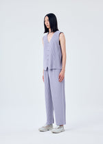 A model wears the HOMME PLISSÉ ISSEY MIYAKE TAILORED PLEATS 2 vest.