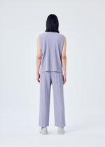 A model wears the HOMME PLISSÉ ISSEY MIYAKE TAILORED PLEATS 2 vest.