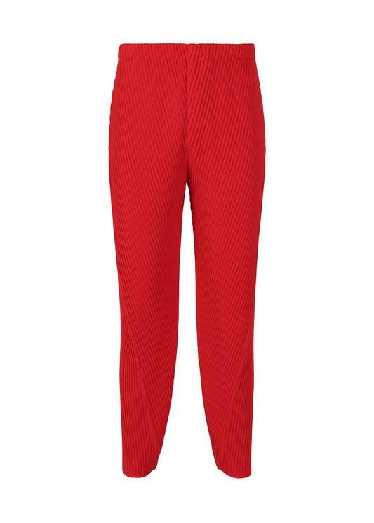 A product shot of the HOMME PLISSÉ ISSEY MIYAKE PLEATS BOTTOMS 2 trousers in red (24).