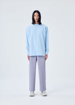 A model wears the HOMME PLISSÉ ISSEY MIYAKE TAILORED PLEATS 2 trousers.