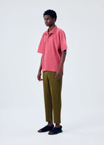 A model wears the HOMME PLISSÉ ISSEY MIYAKE MC APRIL shirt.