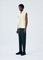 A model wears the HOMME PLISSÉ ISSEY MIYAKE TURBINE top.