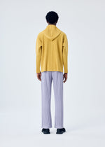 A model wears the HOMME PLISSÉ ISSEY MIYAKE MC JUNE shirt.
