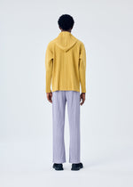A model wears the HOMME PLISSÉ ISSEY MIYAKE MC JUNE shirt.