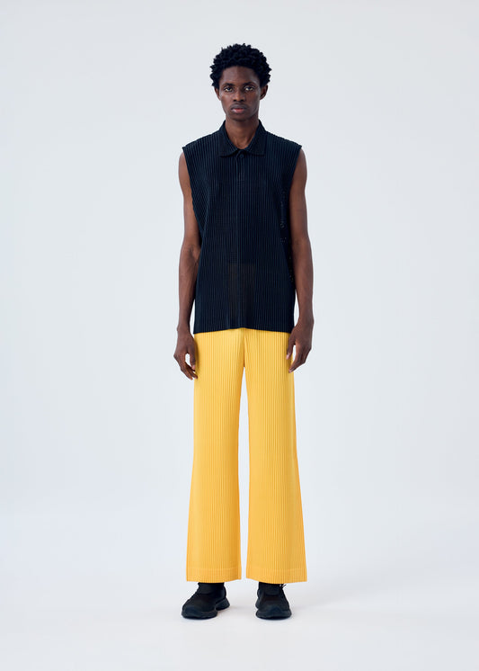A model wears the HOMME PLISSÉ ISSEY MIYAKE LIGHT MESH shirt.