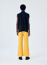 A model wears the HOMME PLISSÉ ISSEY MIYAKE LIGHT MESH shirt.