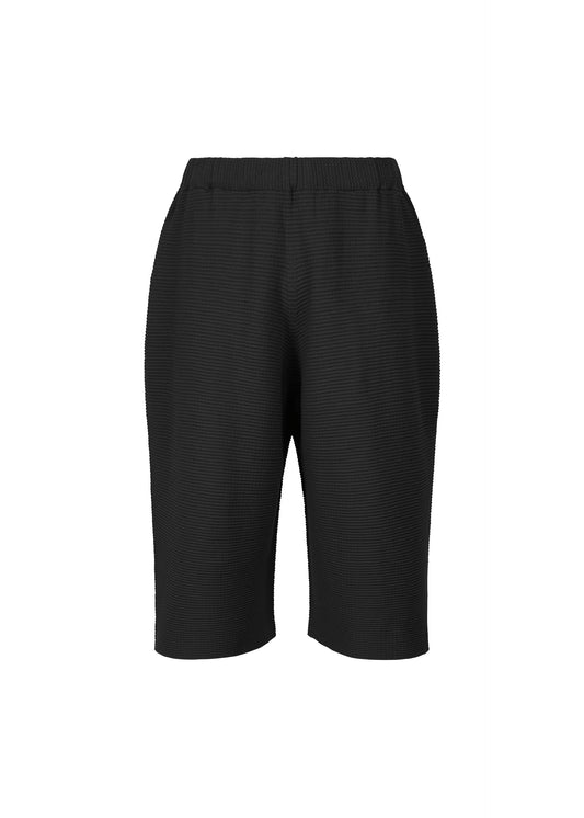 A product shot of the HOMME PLISSÉ ISSEY MIYAKE TIGHT TWIST COTTON KNIT trousers in black (15).