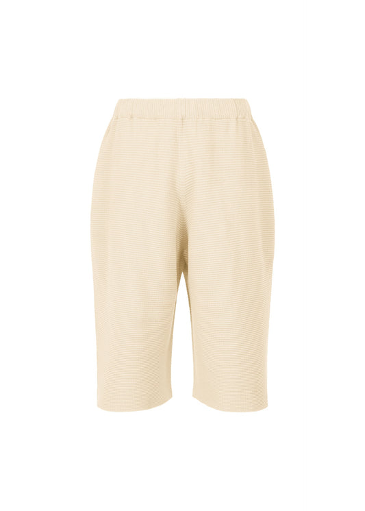 A product shot of the HOMME PLISSÉ ISSEY MIYAKE TIGHT TWIST COTTON KNIT trousers in beige (40).