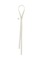A detail shot of the HOMME PLISSÉ ISSEY MIYAKE PLEATS TIE tie.
