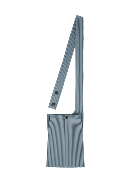 A product shot of the HOMME PLISSÉ ISSEY MIYAKE POCKET bag in slate blue (71).