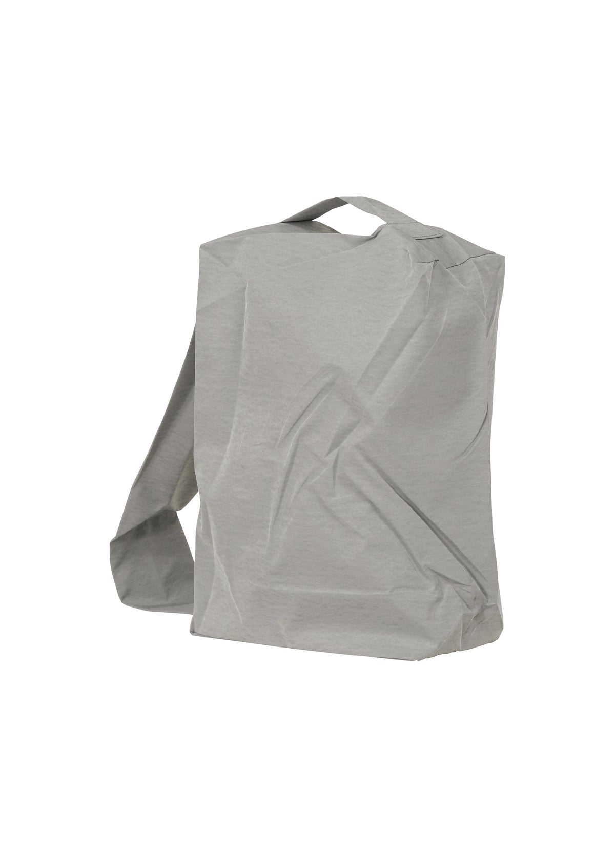 A detail shot of the HOMME PLISSÉ ISSEY MIYAKE STONE BAG bag.