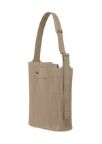 A detail shot of the HOMME PLISSÉ ISSEY MIYAKE UTILITY bag.