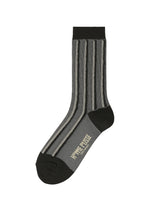 A product shot of the HOMME PLISSÉ ISSEY MIYAKE MASONRY SOCKS socks in black (15).
