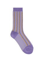 A detail shot of the HOMME PLISSÉ ISSEY MIYAKE MASONRY SOCKS socks.