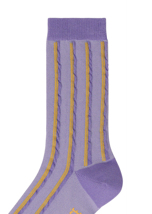 A detail shot of the HOMME PLISSÉ ISSEY MIYAKE MASONRY SOCKS socks.