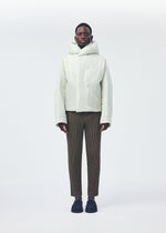 A model wears the HOMME PLISSÉ ISSEY MIYAKE DUVET COAT jacket.