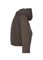 A detail shot of the HOMME PLISSÉ ISSEY MIYAKE DUVET COAT jacket.