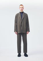A model wears the HOMME PLISSÉ ISSEY MIYAKE EDGE ENSEMBLE jacket.
