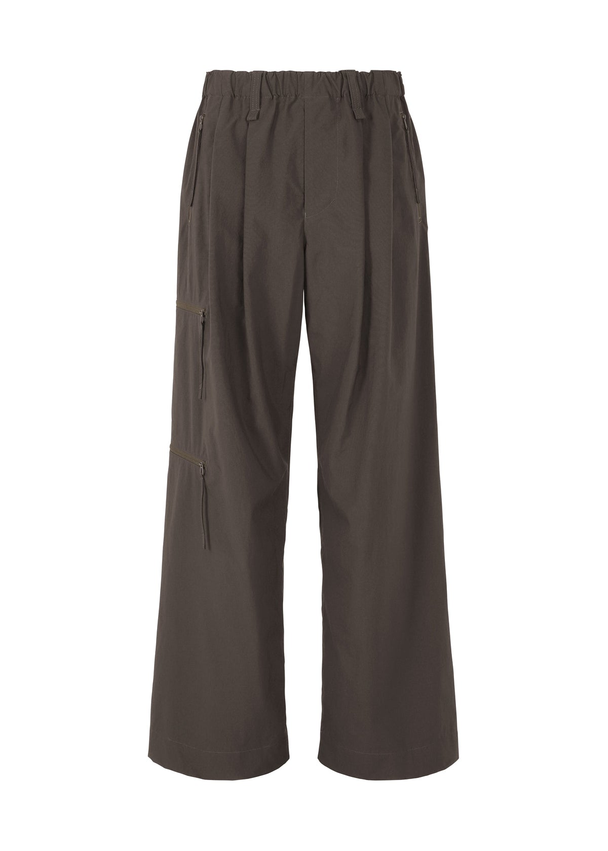A product shot of the HOMME PLISSÉ ISSEY MIYAKE QUARRY PANTS trousers in dark brown (49).