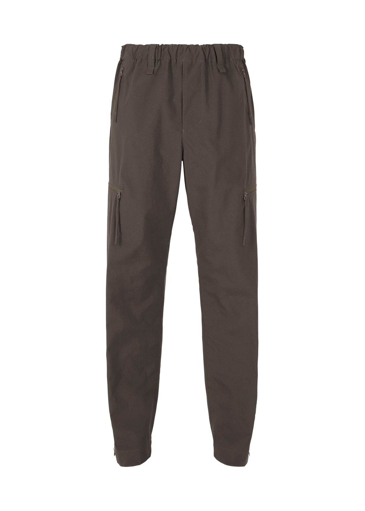 A product shot of the HOMME PLISSÉ ISSEY MIYAKE QUARRY PANTS trousers in dark brown (49).