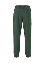 A detail shot of the HOMME PLISSÉ ISSEY MIYAKE QUARRY PANTS trousers.
