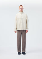 A model wears the HOMME PLISSÉ ISSEY MIYAKE MONTHLY COLORS SEPTEMBER jacket.