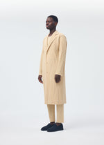 A model wears the HOMME PLISSÉ ISSEY MIYAKE TAILORED PLEATS 2 clothing.