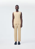 A model wears the HOMME PLISSÉ ISSEY MIYAKE TAILORED PLEATS 2 clothing.