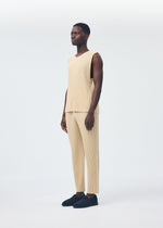 A model wears the HOMME PLISSÉ ISSEY MIYAKE TAILORED PLEATS 2 clothing.