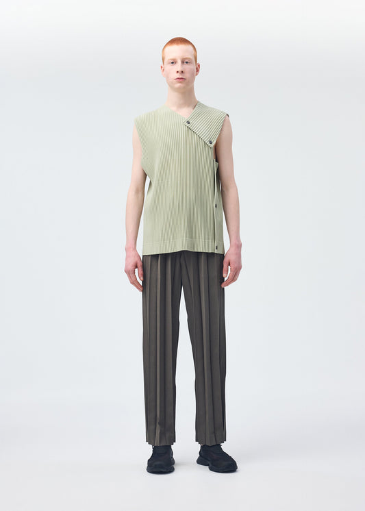 A model wears the HOMME PLISSÉ ISSEY MIYAKE STONE CLOUD vest.