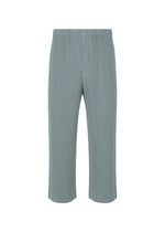A product shot of the HOMME PLISSÉ ISSEY MIYAKE MONTHLY COLORS AUGUST trousers in slate blue (71).