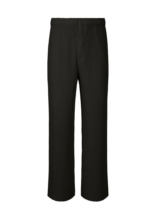 A product shot of the HOMME PLISSÉ ISSEY MIYAKE MONTHLY COLORS SEPTEMBER trousers in black (15).