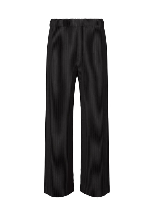 A product shot of the HOMME PLISSÉ ISSEY MIYAKE MONTHLY COLORS OCTOBER trousers in black (15).