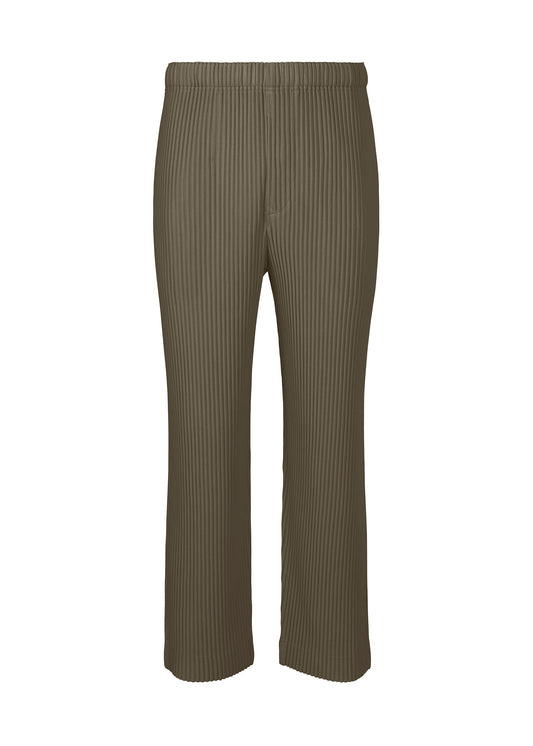 A product shot of the HOMME PLISSÉ ISSEY MIYAKE MONTHLY COLORS NOVEMBER trousers in mudstone grey (17).