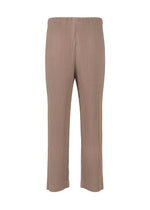 A detail shot of the HOMME PLISSÉ ISSEY MIYAKE COLOR PLEATS trousers.