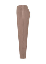 A detail shot of the HOMME PLISSÉ ISSEY MIYAKE COLOR PLEATS trousers.