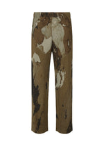 A detail shot of the HOMME PLISSÉ ISSEY MIYAKE PAINTED STONE clothing.