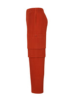 A detail shot of the HOMME PLISSÉ ISSEY MIYAKE MULTI POCKET trousers.