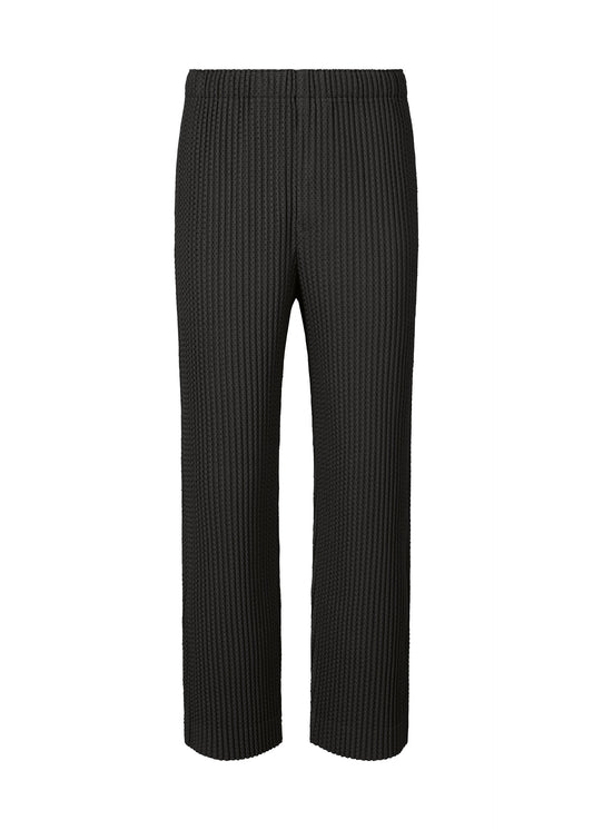 A product shot of the HOMME PLISSÉ ISSEY MIYAKE WICKERWORK MESH trousers in black (15).