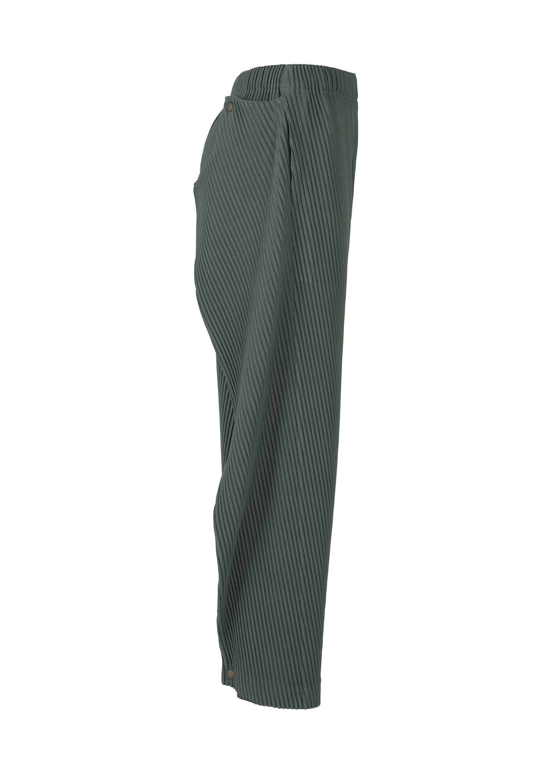 A detail shot of the HOMME PLISSÉ ISSEY MIYAKE ANGULAR STONE trousers.