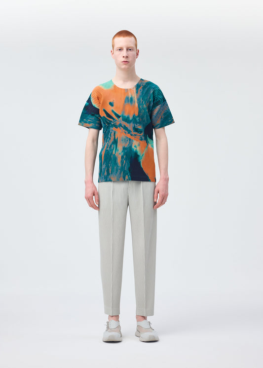 A model wears the HOMME PLISSÉ ISSEY MIYAKE AGATE top.