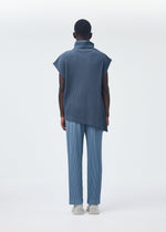 A model wears the HOMME PLISSÉ ISSEY MIYAKE ANGULAR STONE top.
