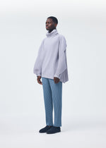 A model wears the HOMME PLISSÉ ISSEY MIYAKE ANGULAR STONE top.