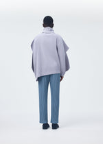 A model wears the HOMME PLISSÉ ISSEY MIYAKE ANGULAR STONE top.