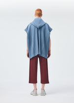 A model wears the HOMME PLISSÉ ISSEY MIYAKE MONTHLY COLORS AUGUST shirt.