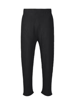 A product shot of the HOMME PLISSÉ ISSEY MIYAKE BASIC KNIT trousers in black (15).