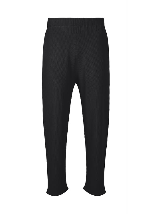 A product shot of the HOMME PLISSÉ ISSEY MIYAKE BASIC KNIT trousers in black (15).