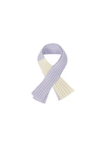 A detail shot of the HOMME PLISSÉ ISSEY MIYAKE PENNE tie.